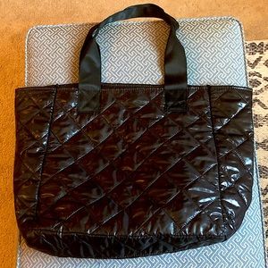 Black quilted tote bag from Saks Fifth Avenue